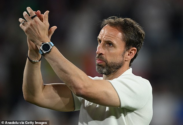 England fans throw plastic cups towards Gareth Southgate and BOO