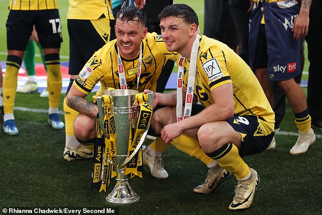 Former Chelsea youngster Josh McEachran (left) helped Oxford United secure a place in the Championship next season