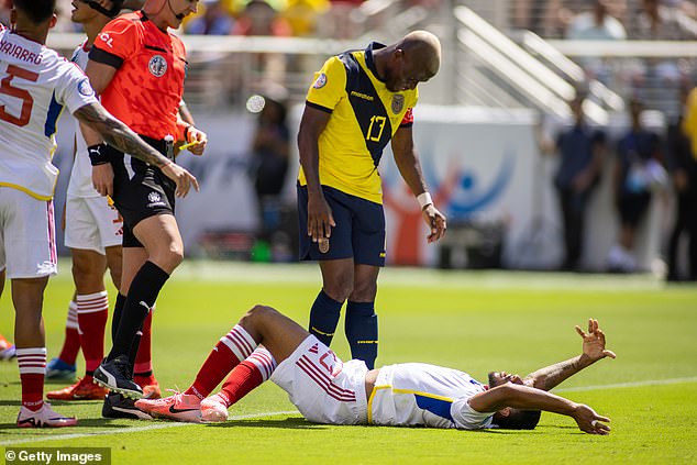 Martinez was left in a heap as the play was reviewed and Valencia was eventually sent off