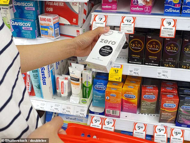 The pharmacy co-owner explained that all contraceptive items, including condoms, were not sold in store (photo: customer choosing condoms in Coles healthcare aisle)