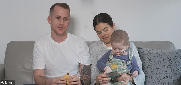 Tyler, Alix and baby Hazzy are pictured. Hazy's parents are urging the Australian government to give them access to a life-saving drug known as DFMO
