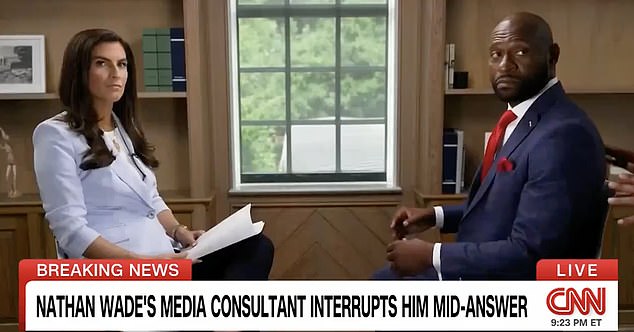 Former Trump special counsel Nathan Wade (right) was in the middle of an interview with CNN's Kaitlan Collins (left) on Wednesday when he was suddenly interrupted by a 