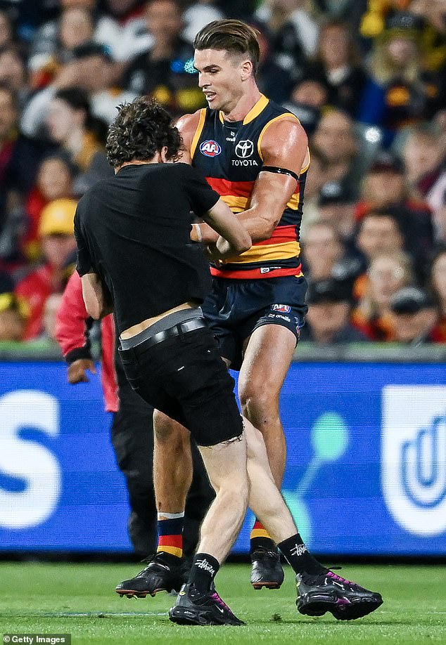 A footy fan who stormed the field during an AFL match at the Adelaide Oval (pictured) branded himself a 'legend' after leaving the court on Wednesday