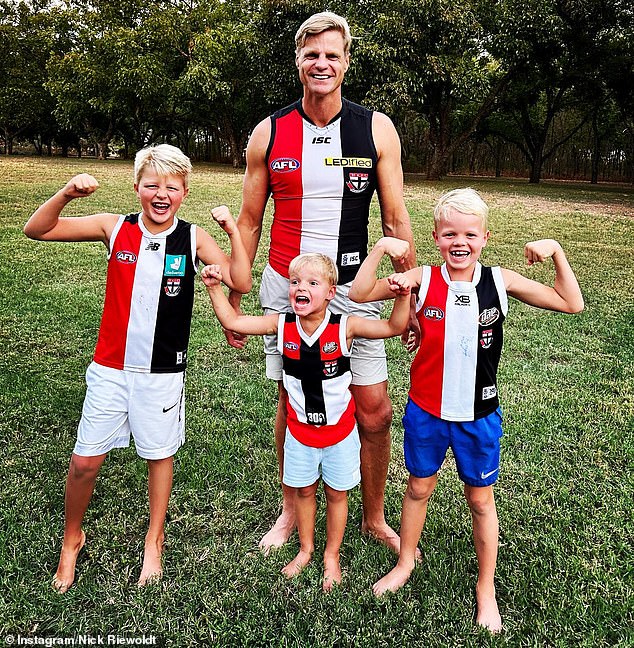 The St. Kilda great wanted to celebrate the occasion with his three boys (pictured) who are all in the US where the family is based