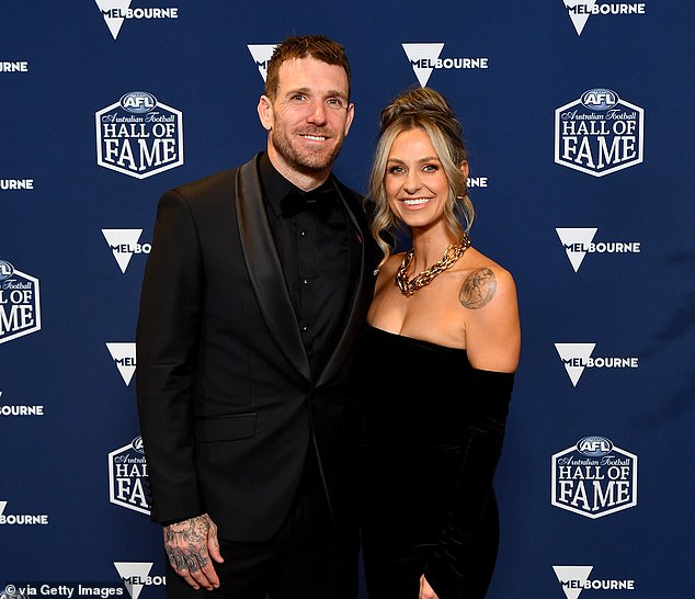 Dane Swan (pictured with girlfriend Taylor Wilson) was inducted into the AFL Hall of Fame