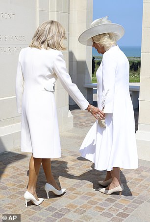 Brigitte Macron tried to hold hands with Queen Camilla at the British Normandy Memorial in Ver-sur-Mer