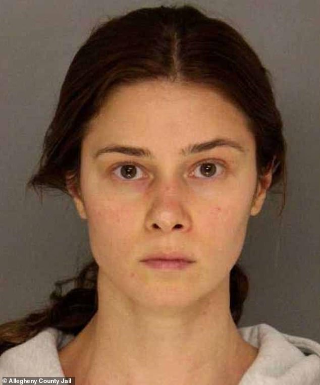 Virzi, 29, seen in her booking photo, was babysitting the child while his parents were at UPMC Children's Hospital of Pittsburgh with his twin brother after Virzi said she noticed an injury to his groin