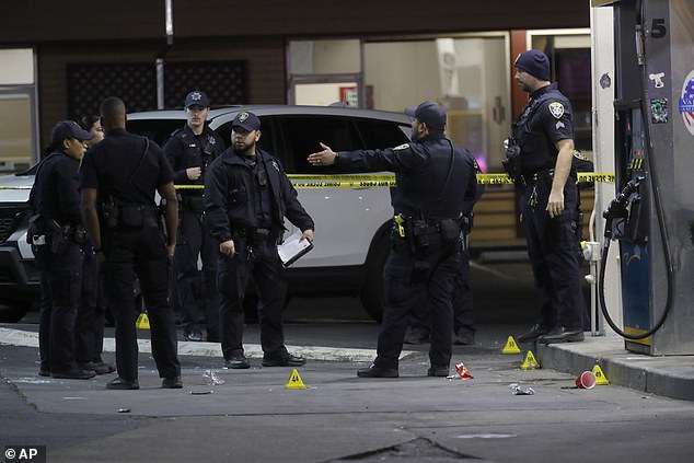 Oakland has been rocked by violent crime in recent months, including homicides that rose from 78 in 2019 to 126 last year.  Pictured: Police investigate a multiple shooting and murder at an Oakland gas station on January 23, 2023
