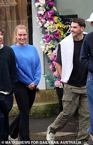 Grace looked smitten with her boyfriend as they spent quality time with their friends