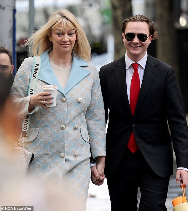 Greg Lynn's second wife Melanie (left) and Lisa's son Geordie arrive at court during Lynn's trial