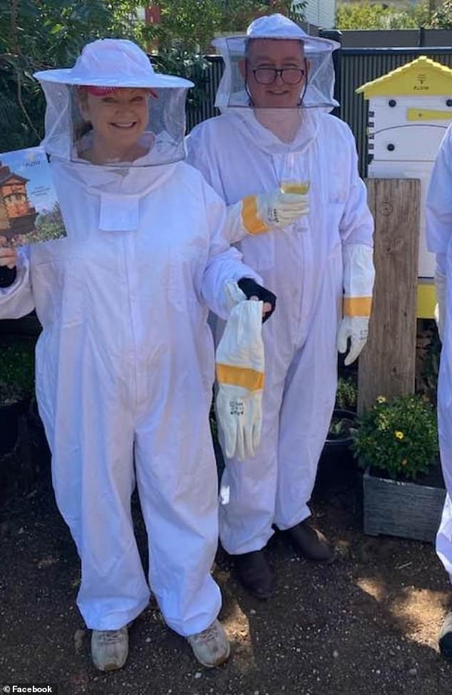Greg Lynn (right) and his wife Melanie (left) took up beekeeping as a hobby to keep themselves busy during the Covid pandemic