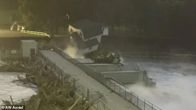 Footage captured the moment a family's home collapsed into the Rapidan Dam after historic flooding