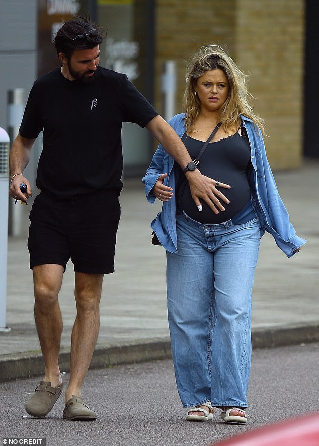 The TV presenter, 37, who revealed in March she was six months pregnant, was seen with her scientist boyfriend Alistair Garner, 37