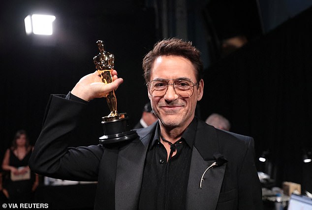 It's Robert Downey Jr.!  The star – now 59 – won his Best Supporting Actor Oscar in 2024 for his role as Admiral Lewis Strauss in Oppenheimer