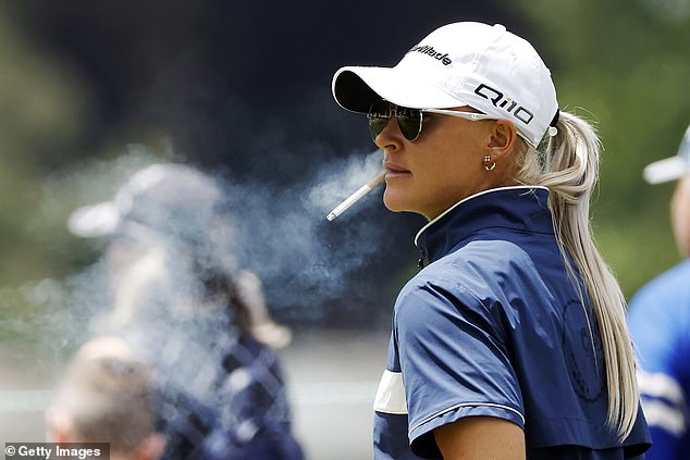 The world number 8 was filmed last month signing autographs with a lit cigarette in her mouth
