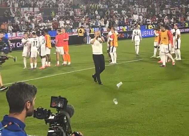Beer in plastic cups was thrown at him after his team's draw against Slovenia