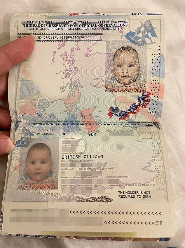 Smolik's passport can be seen in this image with redacted details