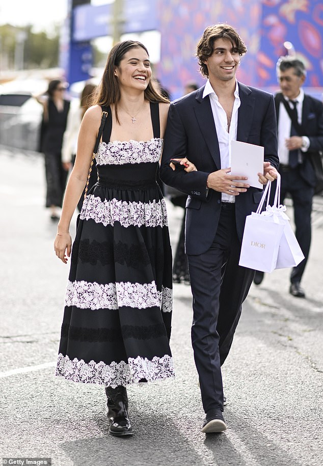 Emma Raducanu wears a black and white lace Dior dress with her ex-boyfriend Carlo Agostinelli during the S?S 2024 Paris Fashion week