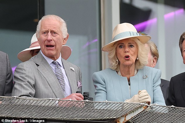 The couple were on the edge of their seats as they watched their horse Treasure race in the Oaks on Epsom's Ladies Day yesterday