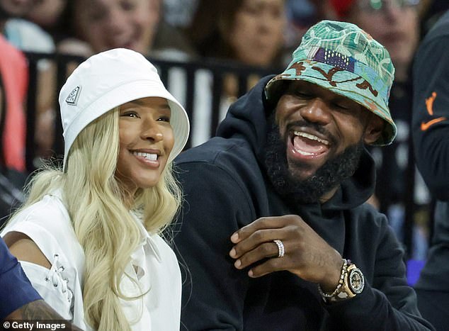 Savannah and LeBron James attend a WNBA game between the Aces and Liberty on June 15