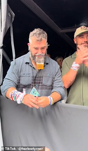 Kelce impressively held a beer with his mouth as he showed off his numerous bracelets