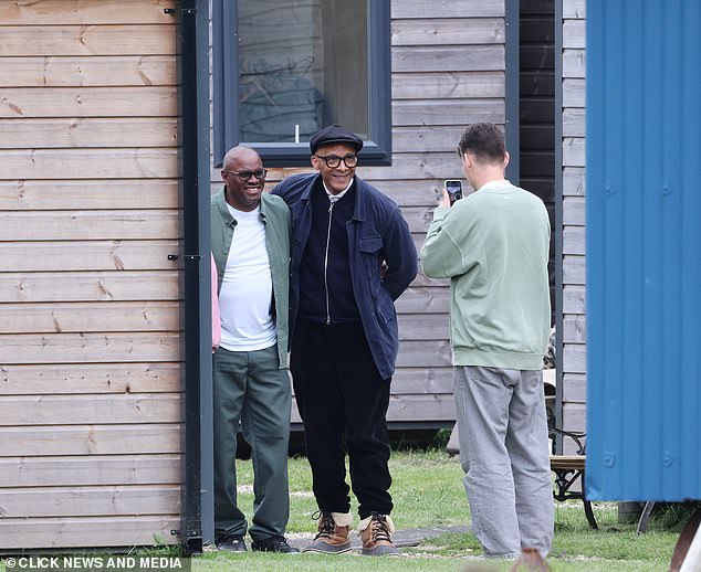 The TV star wore his signature black flat cap, black zip-up overalls and a navy blue jacket as he started the upcoming episodes.