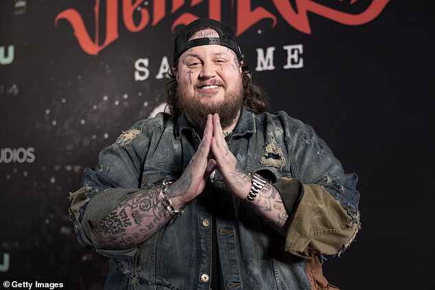 When asked about ink he regrets appearing on the June 12 episode of The Howard Stern Show, Jelly Roll revealed, “I have a tattoo on my arm that I gave someone a quarter bag of bad weed for, and it looks like a quarter bag of bad weed.  bad weed tattoo' (pictured in Nashville in May 2023)
