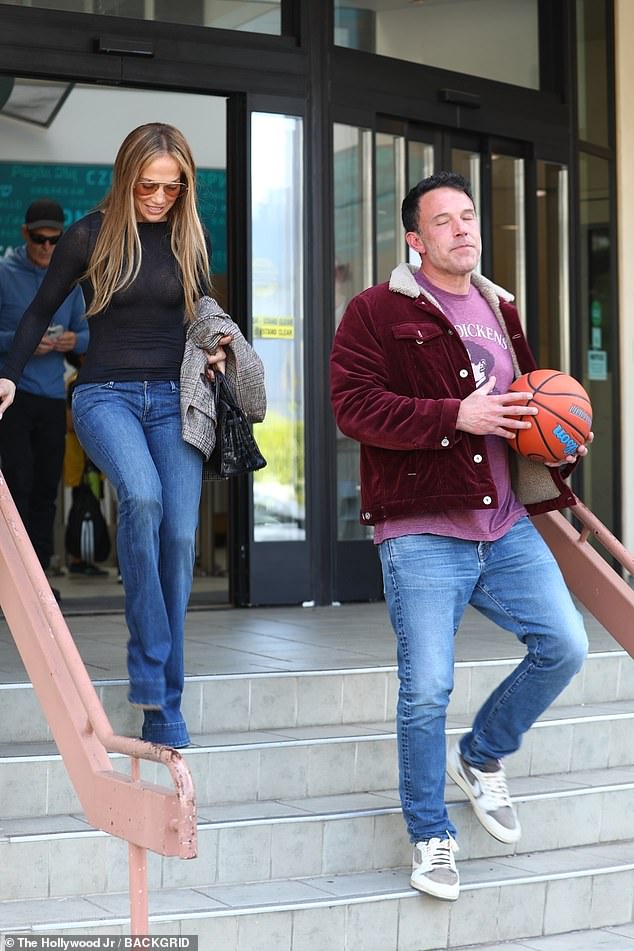 Jennifer Lopez and Ben Affleck are reportedly living 'separate lives' amid ongoing rumors of marital problems (pictured June 2)