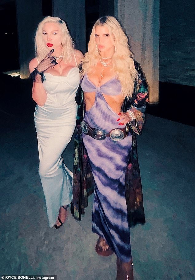 Simpson was accompanied by Kim Kardashian's close friend Joyce Bonelli, a wardrobe stylist.  The two were arm in arm and seemed to be good friends.