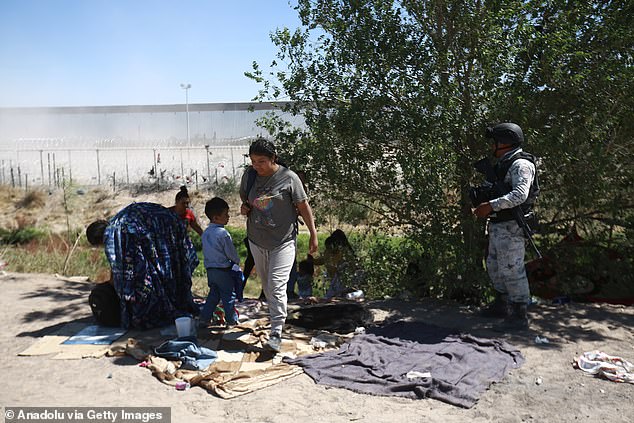 A group of about 100 migrants are returned to Mexico by the National Guard on May 30, near El Paso, Texas.  Under Joe Biden, nearly 8 million migrants have entered the US in just three and a half years.