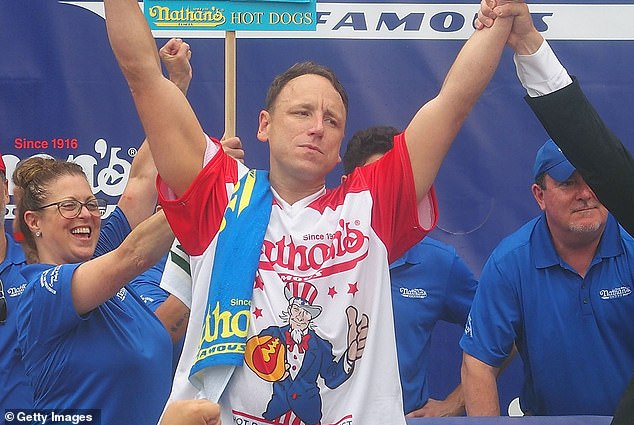 American competitive eater Joey Chestnut says he has been banned from this summer's Nathan's Fourth of July Hot Dog Eating Contest on Coney Island because of his sponsorship of a vegan rival