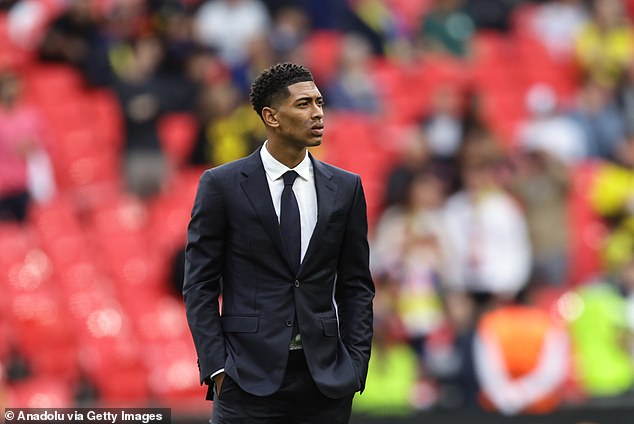 The superstar was a picture of calm ahead of kick-off after arriving in a sharp suit