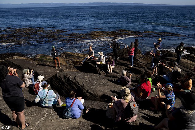 A route used by BNSF to transport crude oil crossed sensitive waterways where the tribe has treaty-protected fishing rights (photo: Visitors watch an environmental health analyst from the Swinomish Indian Tribal Community give a presentation in the tidal pools of Salt Creek during the Tribal Climate Camp on the Olympic Peninsula)