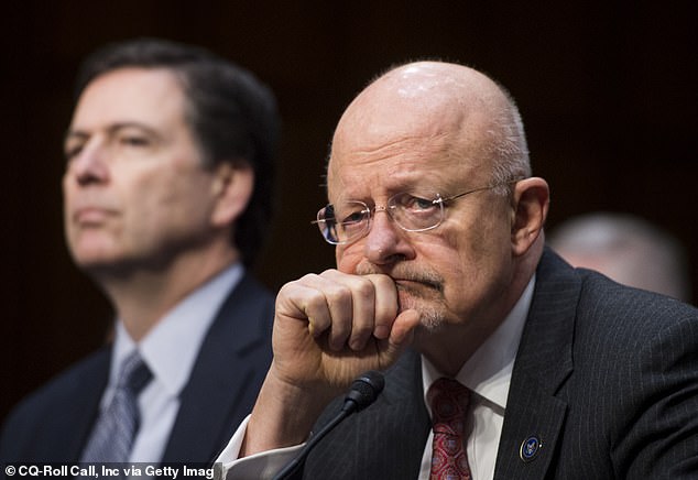 Former Director of National Intelligence James Clapper, pictured next to former FBI Director James Comey, gave his thoughts on Assange in an interview with the BBC on Wednesday morning