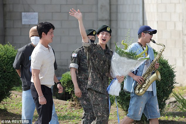 K-pop boy band BTS member Jin is seen in good spirits after being discharged from military service in Yeoncheon, South Korea, after spending more than 500 days on base