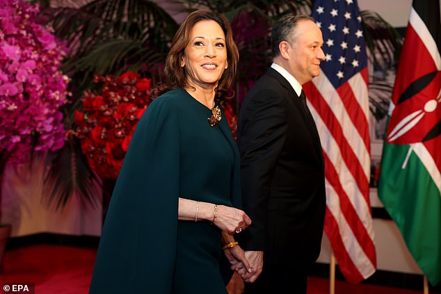 US Vice President Kamala Harris (L) and Second Gentleman Doug Emhoff (R) arrive to attend a state dinner