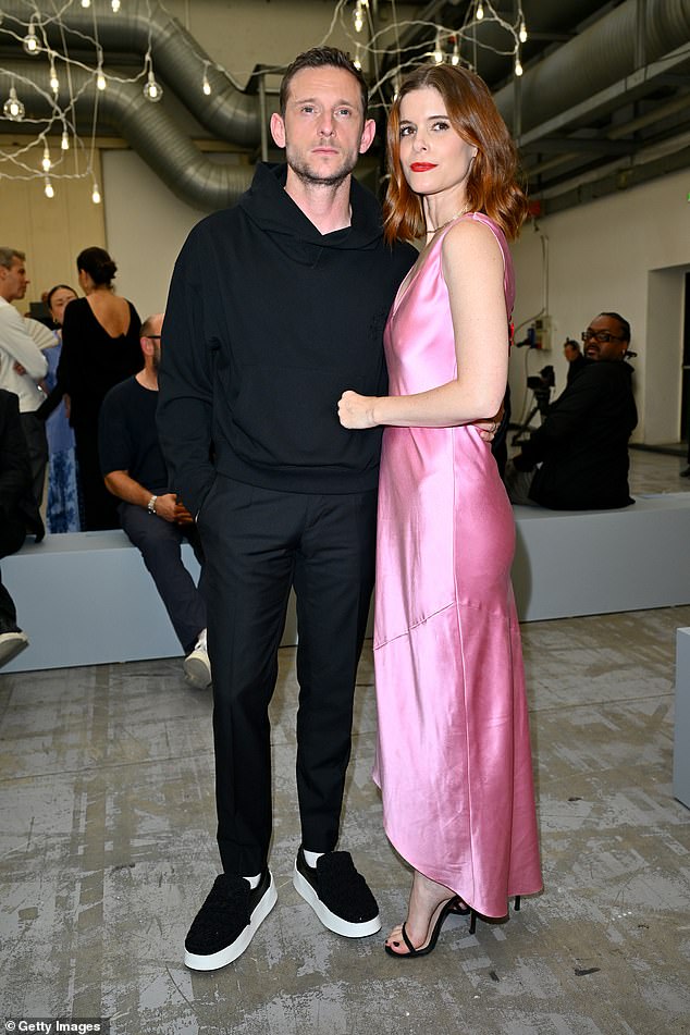 Kate Mara looked glamorous as she made a rare amorous appearance with her husband Jamie Bell at the JW Anderson fashion show in Milan on Sunday evening
