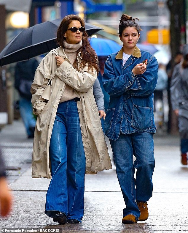 Katie Holmes has revealed her 18-year-old daughter Suri often steals her clothes, speaking in a rare interview on Sunday
