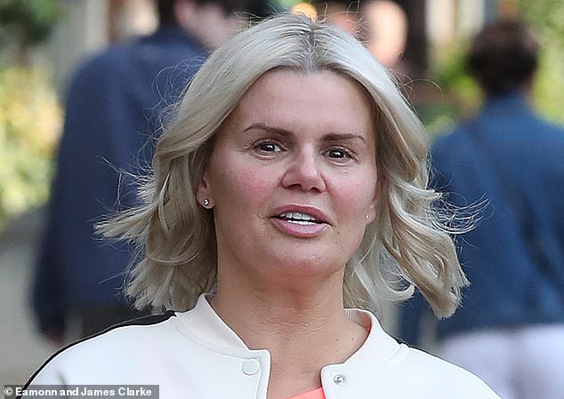 Kerry Katona, 43, looked drastically different as she stepped out in Cheshire on Thursday after undergoing a nose job - the results of which left her in tears