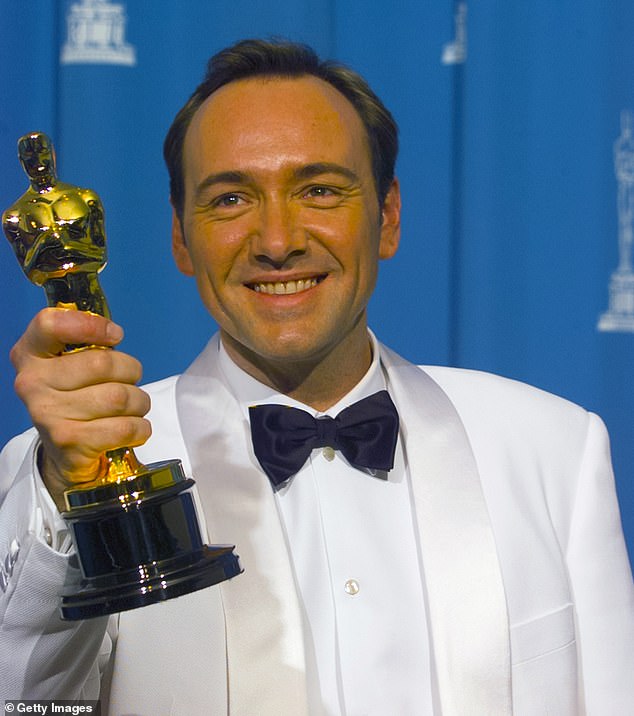 The two-time Oscar-winning actor has defiantly vowed not to give up acting after seven years in 'exile' (Spacey pictured in Los Angeles in 1996 after winning Best Supporting Actor for his role in The Usual Suspects)