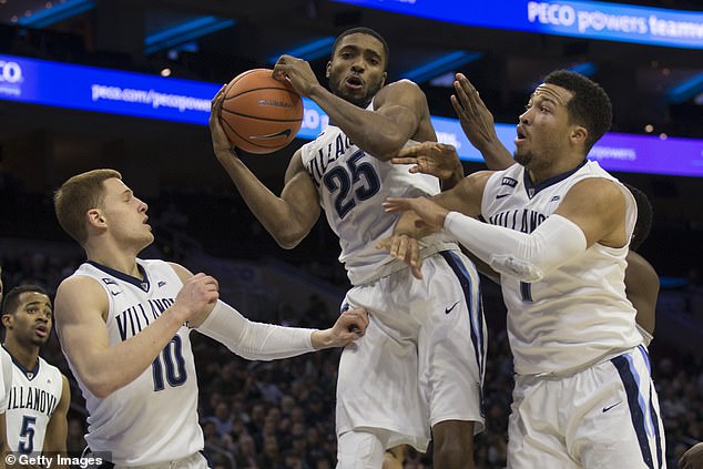 Bridges grabs a rebound in front of Villanova teammates Donte DiVincenzo (left) and Jalen Brunson (right) in 2018. The trio is now reunited with the New York Knicks