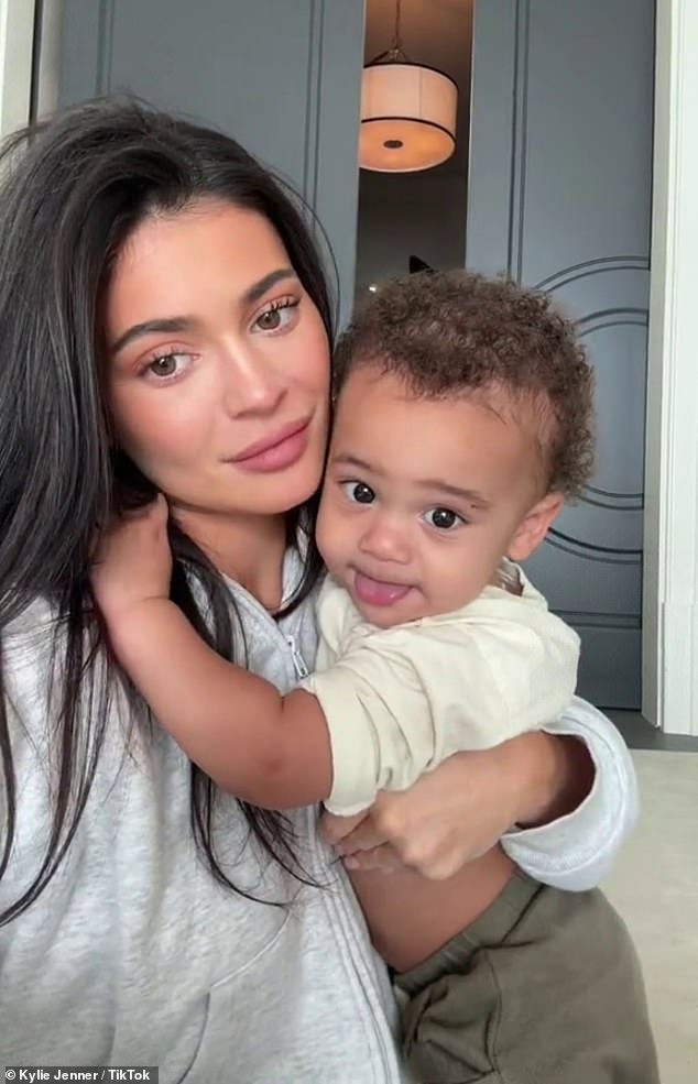 Kylie Jenner is reviving her viral way of singing children's melodies, four years after her iconic song 'Rise and Shine'.  The reality TV personality, 26, took to Instagram on Friday night to share a clip of her and her two-year-old son Aire singing their ABCs together while sitting at a dining table.