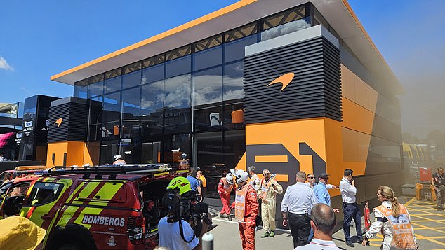 Lando Norris and his McLaren team were dramatically evacuated from their camper at the Spanish Prix today when a fire broke out (pictured above)