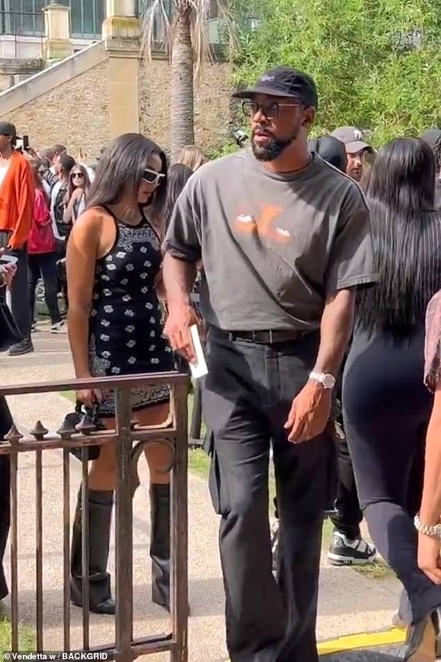 Marcus Jordan was spotted with a mystery brunette at a fashion event in Paris on Thursday