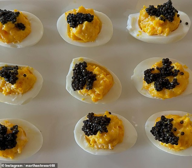 Stuffed eggs were topped with black caviar