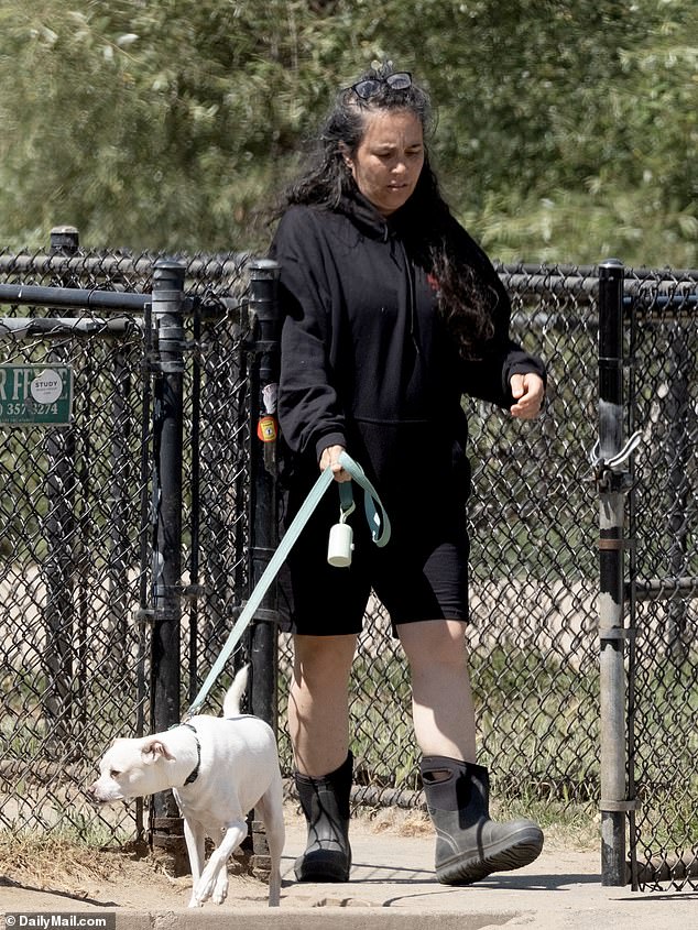 Rothman, who hasn't been photographed since their striking red carpet appearance, now spends her days running errands in the Bay Area city and walking her dog.