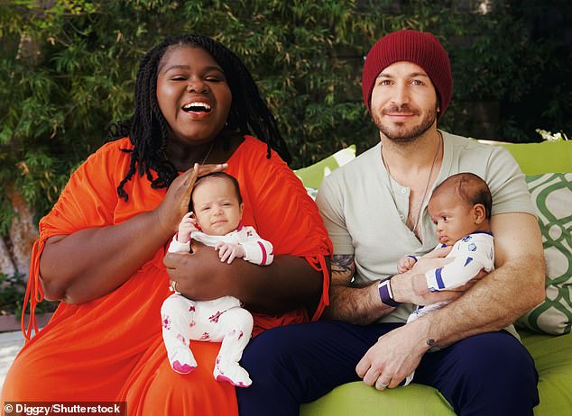 Gabourey Sidibe and her husband Brandon Frankel introduced their newborn twins Cooper and Maya in a series of heartwarming family photos shared Friday