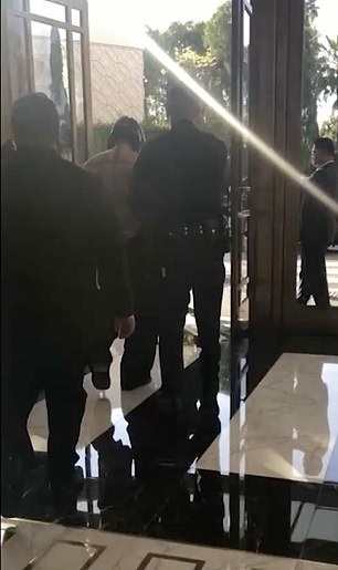 This is the moment Ryan Garcia was walked out of his five-star hotel in Beverly Hills by police