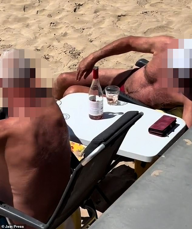 Two British tourists have been taken from a beach in Benidorm after sharing a bottle of wine on the water