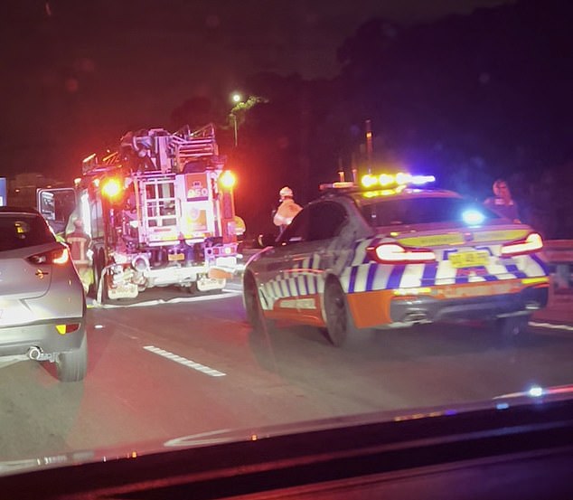 Two people are being treated at the scene after colliding with four cars